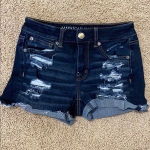 Dark blue, ripped jean shorts